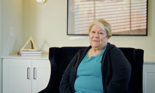 a woman sitting down